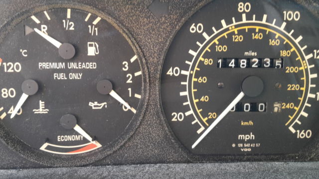 1988 blue Mercedes-Benz 500-Series Sedan