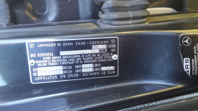 1988 blue Mercedes-Benz 500-Series Sedan