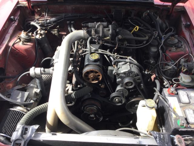 1988 Red Ford Mustang Convertible