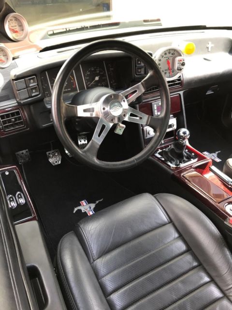 1988 Burgundy Ford Mustang Hatchback