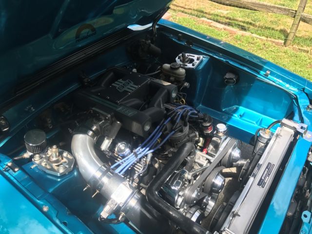 1988 Teal Ford Mustang Hatchback