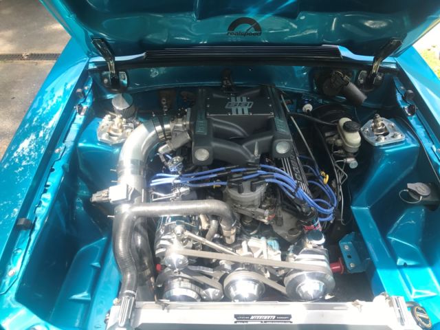 1988 Teal Ford Mustang Hatchback