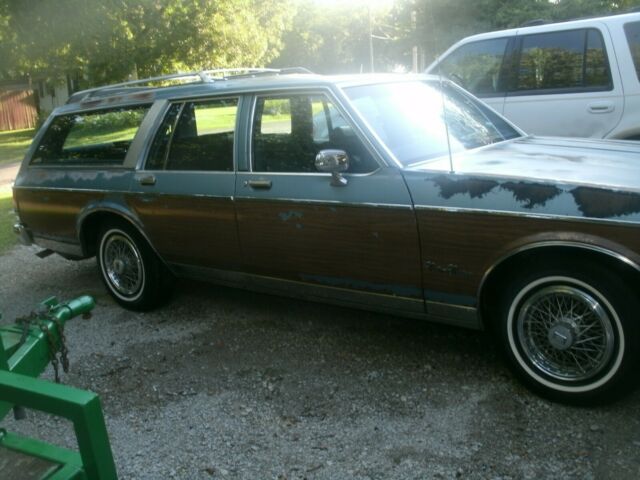 1988 Blue Oldsmobile Custom Cruiser Wagon