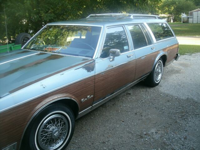 1988 Blue Oldsmobile Custom Cruiser Wagon