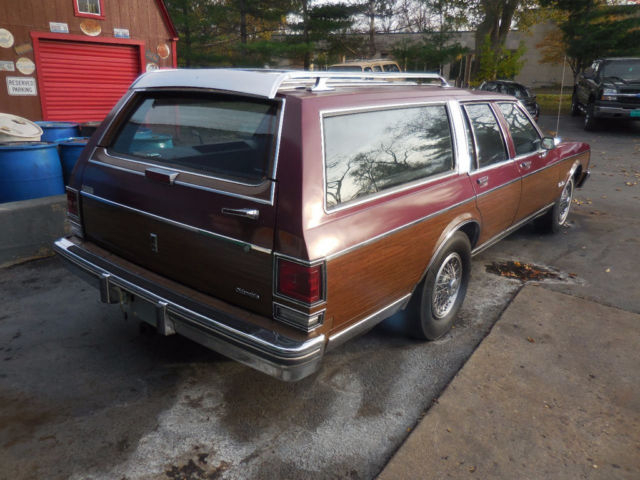 1988 Burgundy Oldsmobile Custom Cruiser Wagon