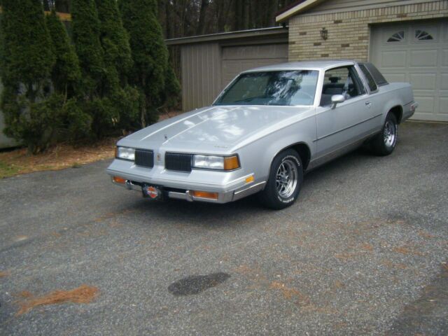 1988 Silver Oldsmobile Cutlass Coupe