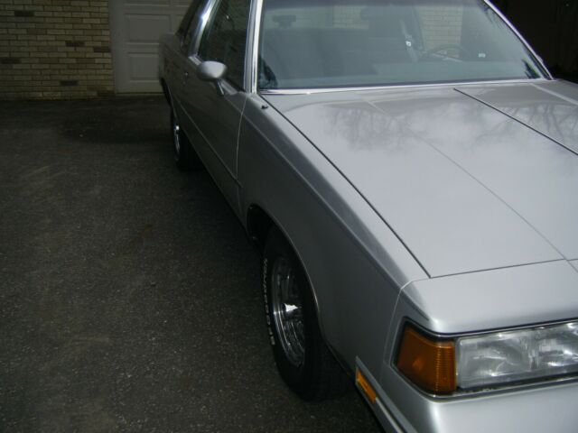 1988 Silver Oldsmobile Cutlass Coupe
