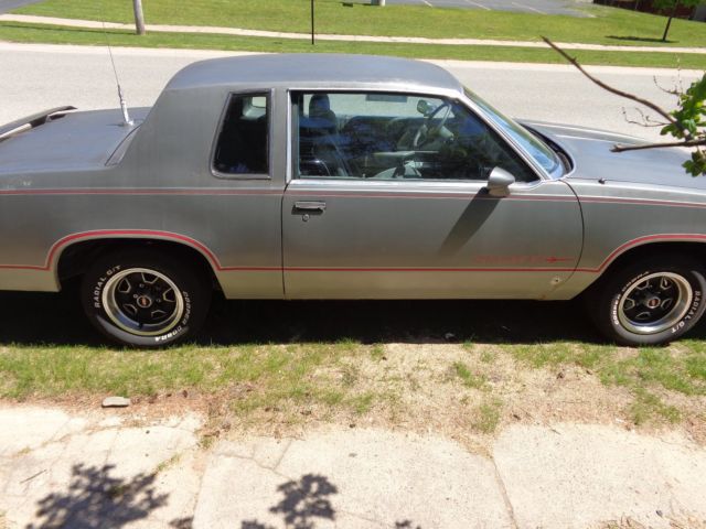 1988 Gray Oldsmobile Cutlass Coupe
