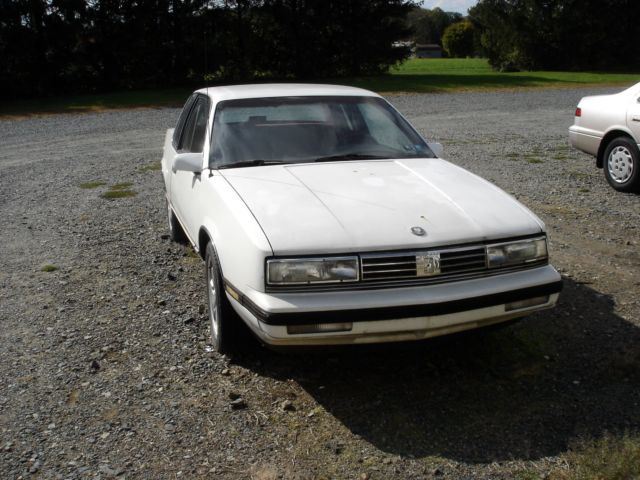 1988 Burgundy Oldsmobile Cutlass Coupe