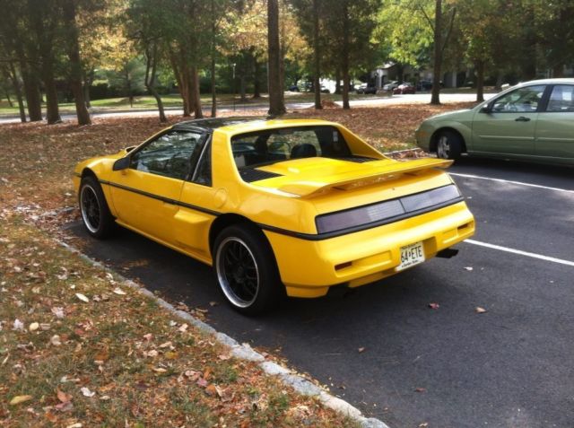 1988 Yellow Pontiac Fiero Coupe