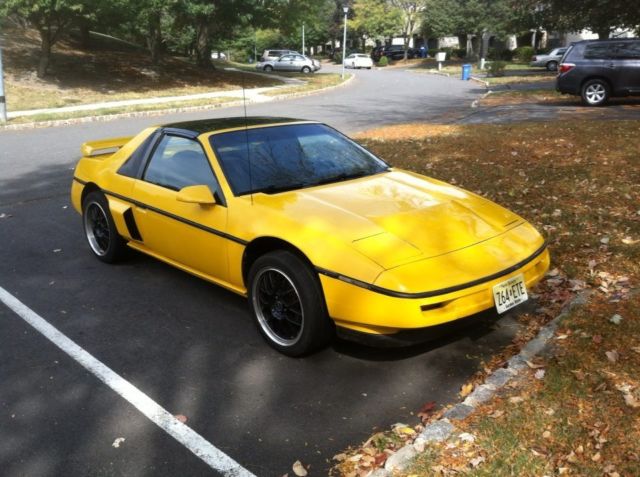 1988 Yellow Pontiac Fiero Coupe