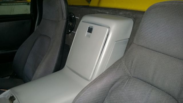 1988 Yellow Pontiac Fiero Coupe