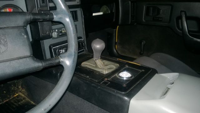 1988 Yellow Pontiac Fiero Coupe