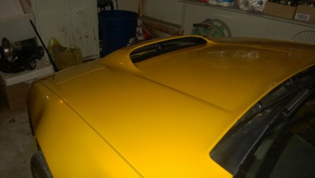 1988 Yellow Pontiac Fiero Coupe