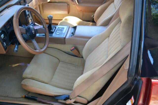 1988 Burgundy Pontiac Fiero Coupe