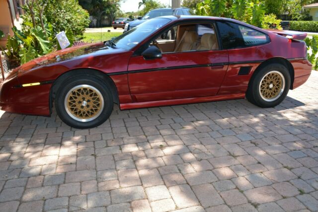 1988 Burgundy Pontiac Fiero Coupe