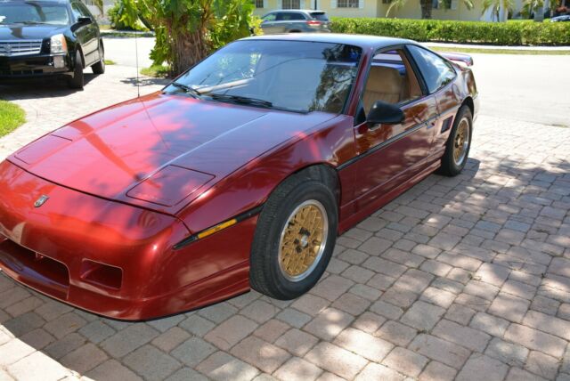 1988 Burgundy Pontiac Fiero Coupe