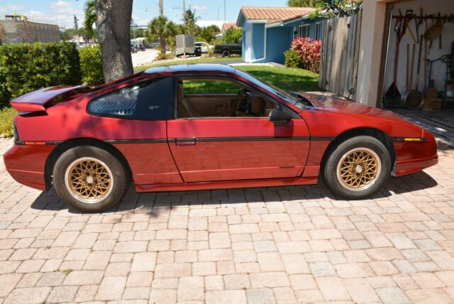 1988 Burgundy Pontiac Fiero Coupe