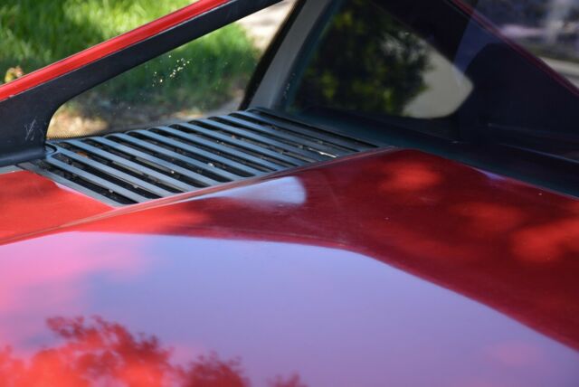 1988 Burgundy Pontiac Fiero Coupe