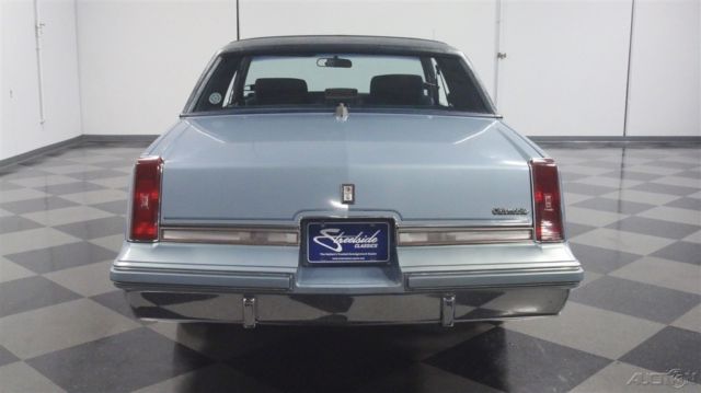 1988 Blue Oldsmobile Cutlass