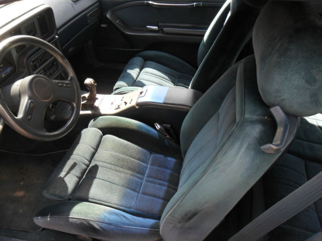 1988 dark blue Ford Thunderbird Coupe