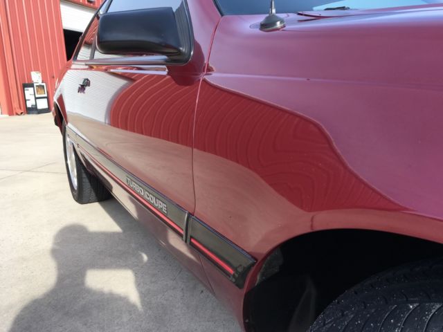 1988 Burgundy Ford Thunderbird Coupe