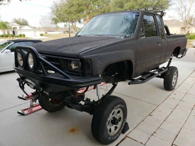 1988 black Toyota Pickup xtra cab