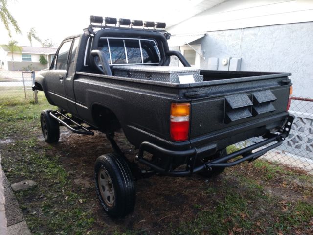 1988 black Toyota Pickup xtra cab