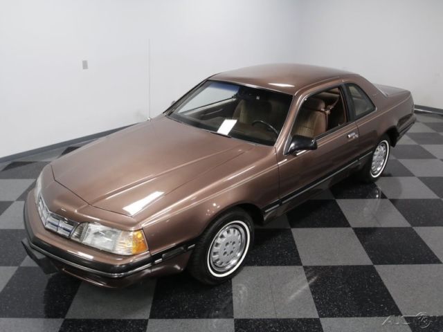 1988 Red Ford Thunderbird