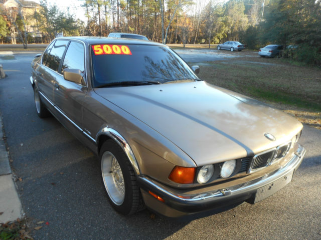 1989 bronze BMW 7-Series Sedan
