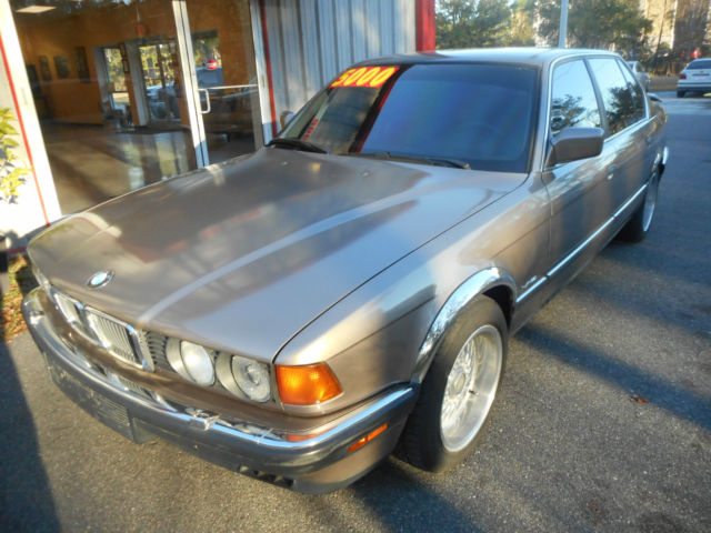 1989 bronze BMW 7-Series Sedan