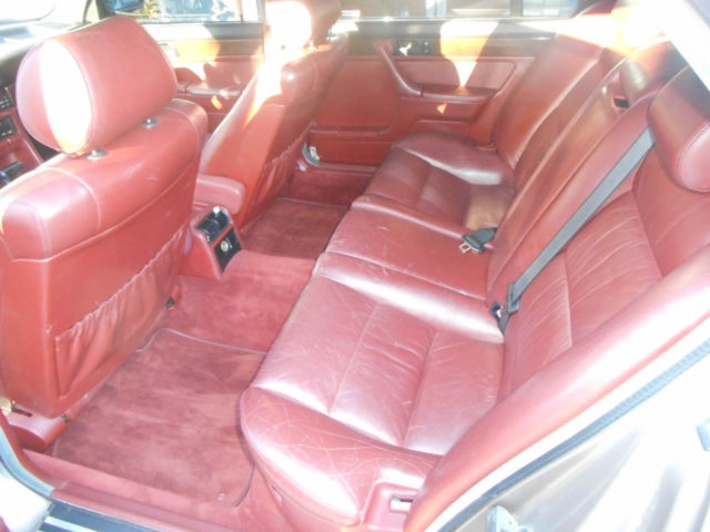 1989 bronze BMW 7-Series Sedan