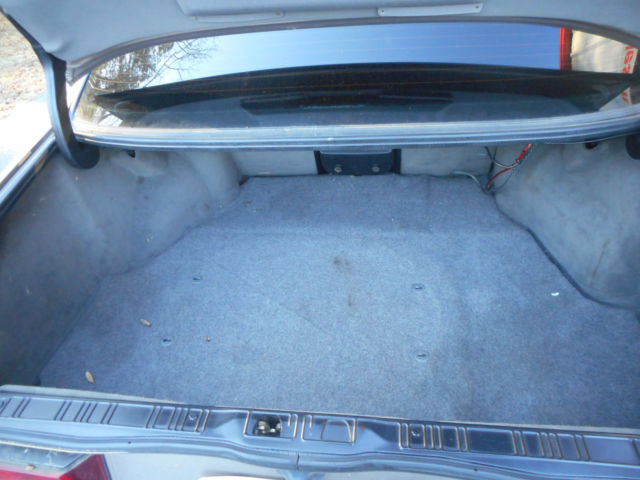 1989 bronze BMW 7-Series Sedan