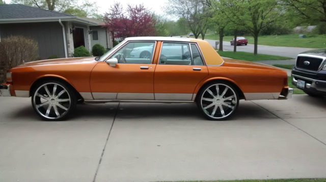 1989 Orange Chevrolet Capriceold Sedan