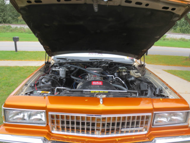 1989 Orange Chevrolet Capriceold Sedan