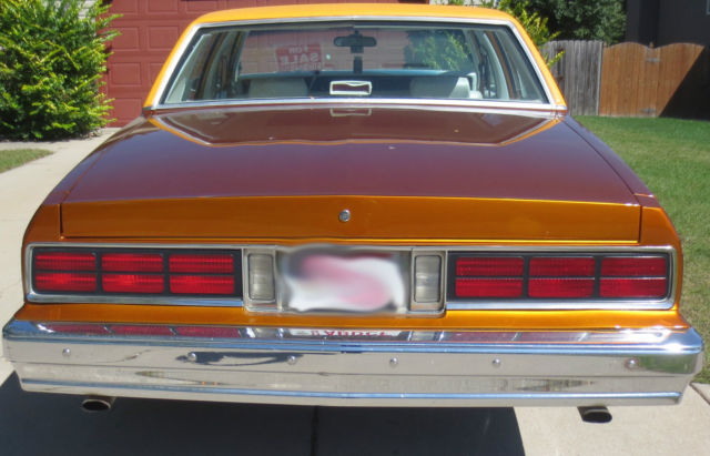 1989 Orange Chevrolet Capriceold Sedan