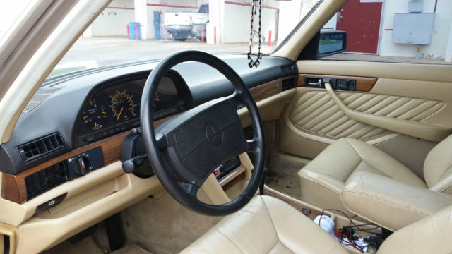 1989 mettalic brown Mercedes-Benz 300-Series Sedan