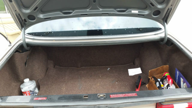 1989 mettalic brown Mercedes-Benz 300-Series Sedan