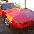 1989 red Chevrolet Corvette