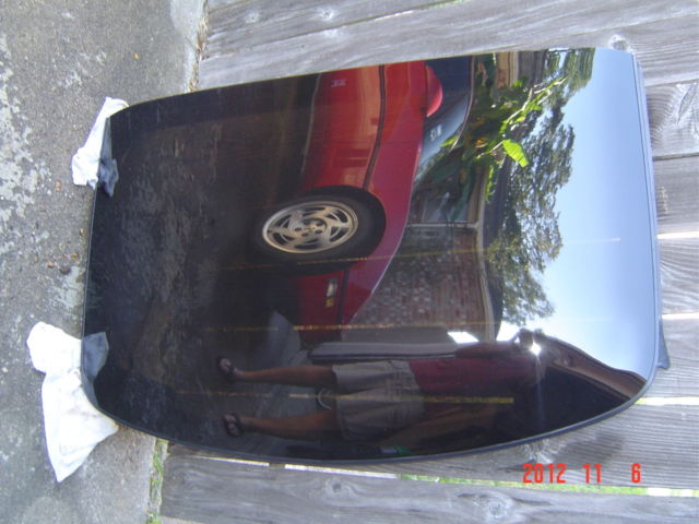 1989 red Chevrolet Corvette