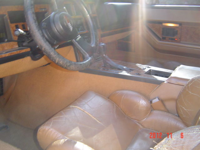 1989 red Chevrolet Corvette