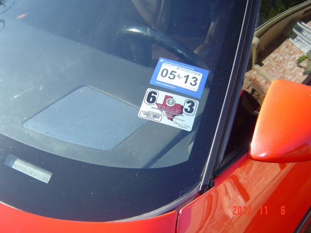 1989 red Chevrolet Corvette