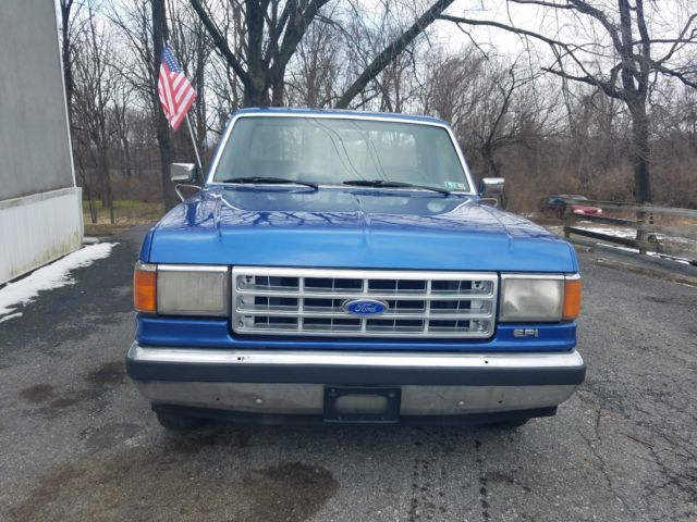 1989 Blue Ford F-150 Extended Crew Cab Pickup