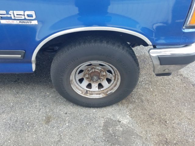 1989 Blue Ford F-150 Extended Crew Cab Pickup