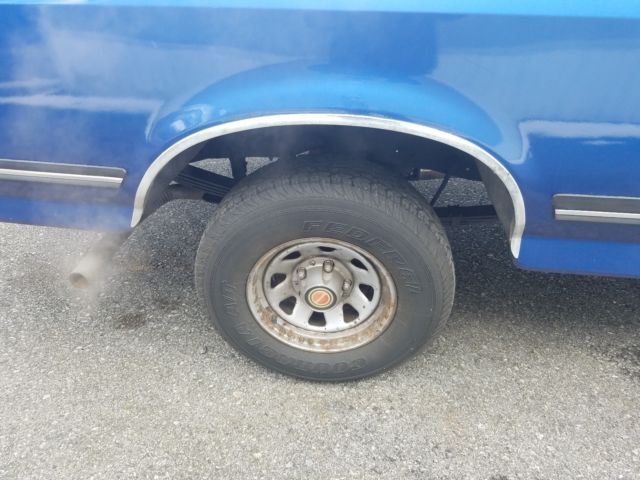 1989 Blue Ford F-150 Extended Crew Cab Pickup