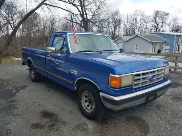 1989 Blue Ford F-150 Extended Crew Cab Pickup