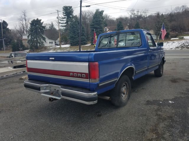 1989 Blue Ford F-150 Extended Crew Cab Pickup