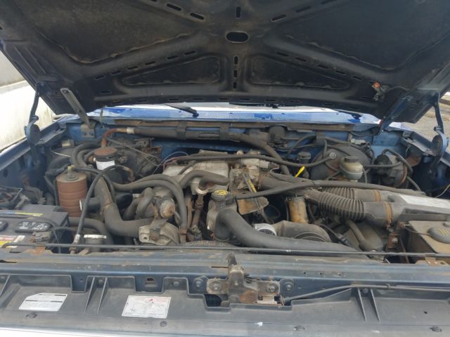 1989 Blue Ford F-150 Extended Crew Cab Pickup