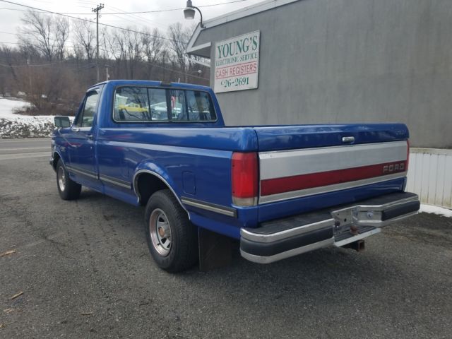 1989 Blue Ford F-150 Extended Crew Cab Pickup