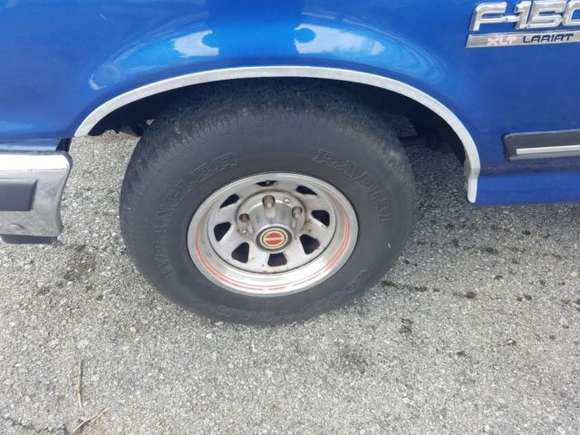 1989 Blue Ford F-150 Extended Crew Cab Pickup